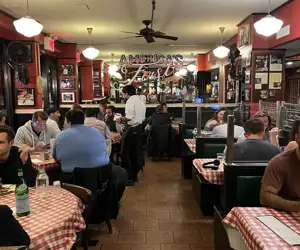 Lombardi's NYC dining room with guests enjoying our famous pizza.